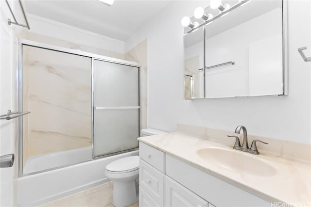 full bathroom with toilet, bath / shower combo with glass door, tile patterned floors, and vanity