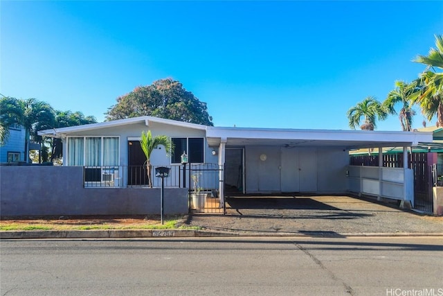 manufactured / mobile home featuring a carport