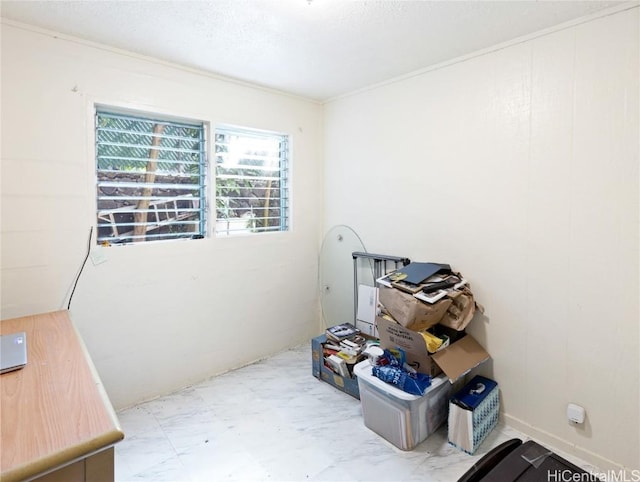 miscellaneous room with ornamental molding