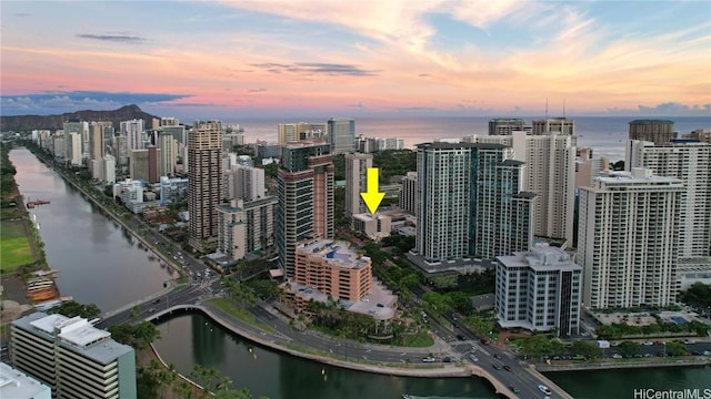 property's view of city featuring a water view