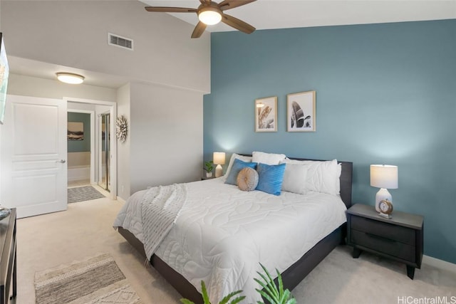 92-1001 Aliinui Dr Unit 25C, Kapolei, HI 96707 - bedroom featuring baseboards, visible vents, light colored carpet, ensuite bathroom, and vaulted ceiling