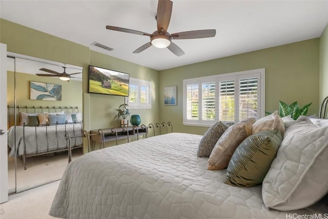 92-1001 Aliinui Dr Unit 25C, Kapolei, HI 96707 - bedroom with visible vents, carpet floors, and a ceiling fan