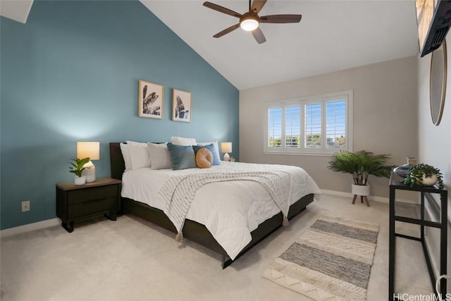 bedroom featuring ceiling fan, light colored carpet, and high vaulted ceiling