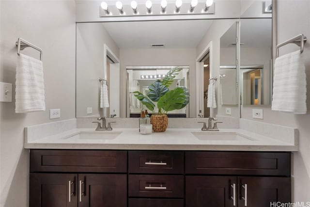 92-1001 Aliinui Dr Unit 25C, Kapolei, HI 96707 - full bathroom featuring visible vents, a sink, and double vanity
