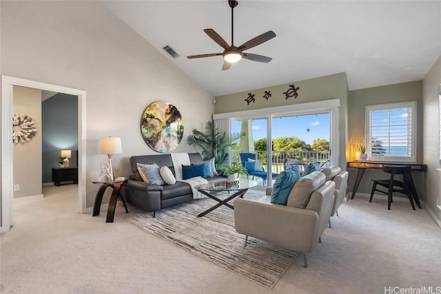 92-1001 Aliinui Dr Unit 25C, Kapolei, HI 96707 - living area with high vaulted ceiling, ceiling fan, visible vents, and light colored carpet
