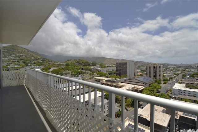 balcony featuring a mountain view