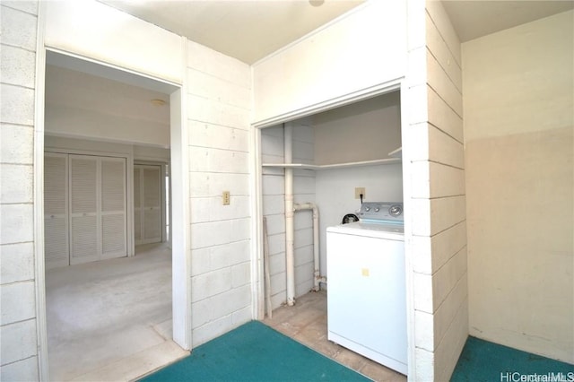 washroom with washer / clothes dryer