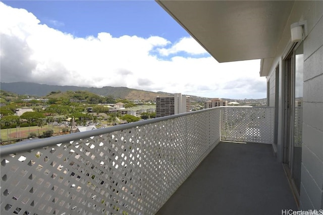 balcony featuring a mountain view