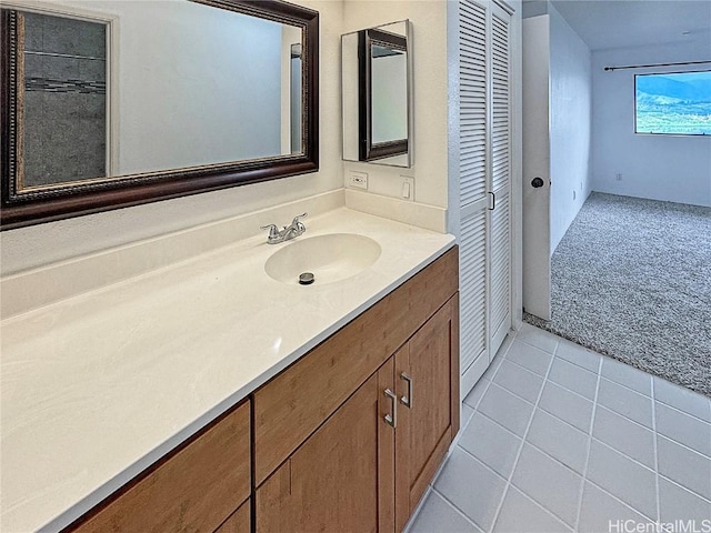 bathroom with vanity and tile patterned floors