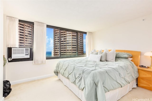 bedroom with carpet flooring and cooling unit