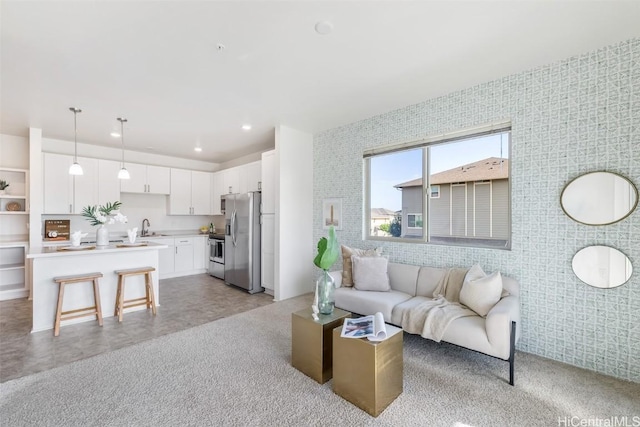 living room featuring sink