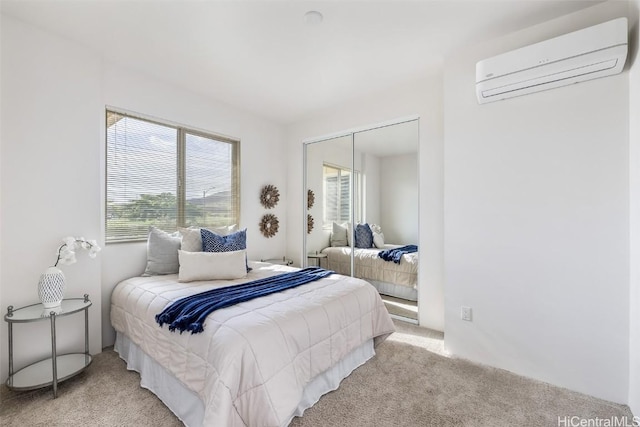 bedroom with multiple windows, an AC wall unit, light colored carpet, and a closet