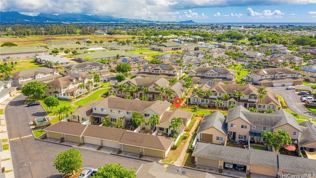 birds eye view of property featuring a mountain view