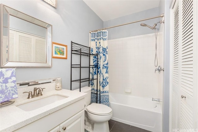 full bathroom with toilet, vanity, tile patterned floors, and shower / bathtub combination with curtain