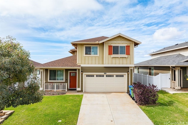 view of front of home featuring a garage and a front lawn