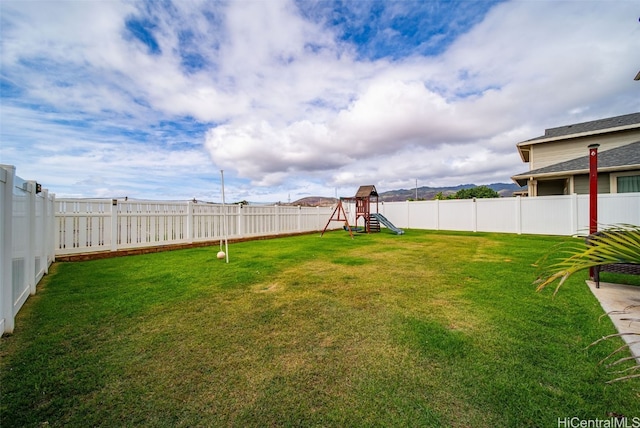 view of yard featuring a playground