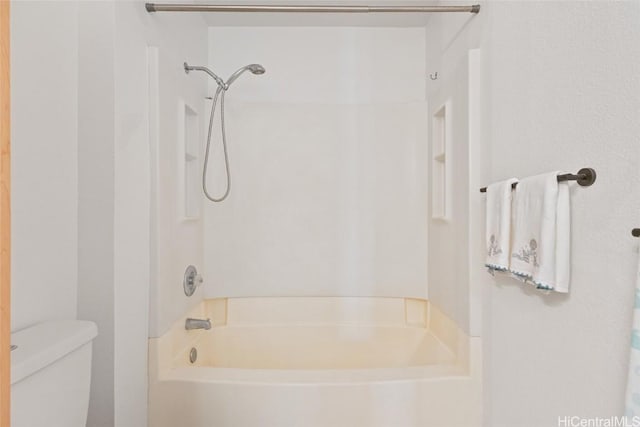 bathroom with toilet and separate shower and tub