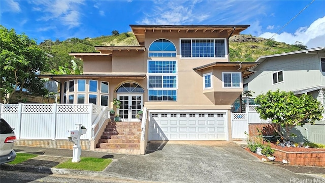 view of front of home with a garage