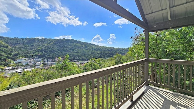 balcony featuring a mountain view