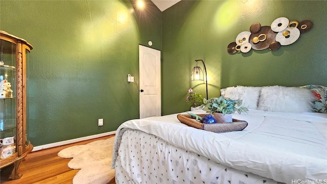 bedroom featuring hardwood / wood-style flooring