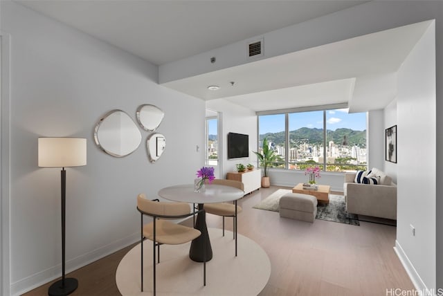 dining space featuring hardwood / wood-style flooring