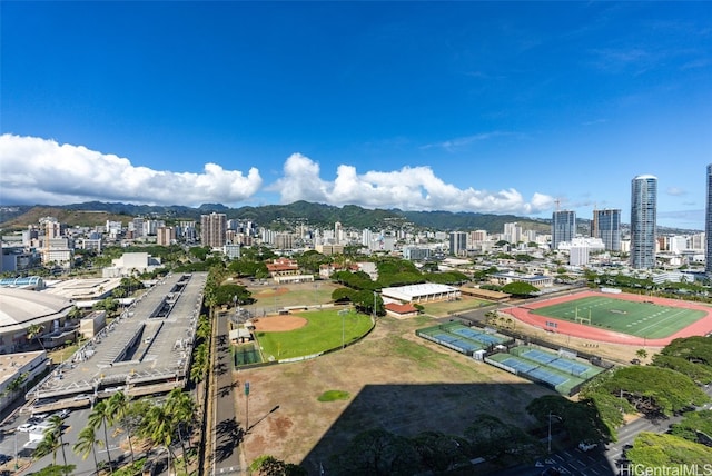 birds eye view of property featuring a mountain view