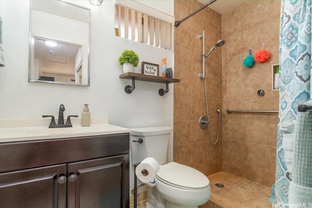 bathroom with a shower with curtain, toilet, and vanity