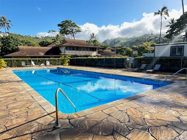 view of pool with a mountain view