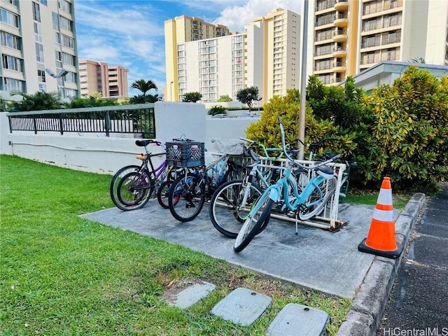 view of property's community with a yard