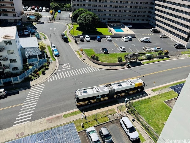 birds eye view of property featuring a view of city