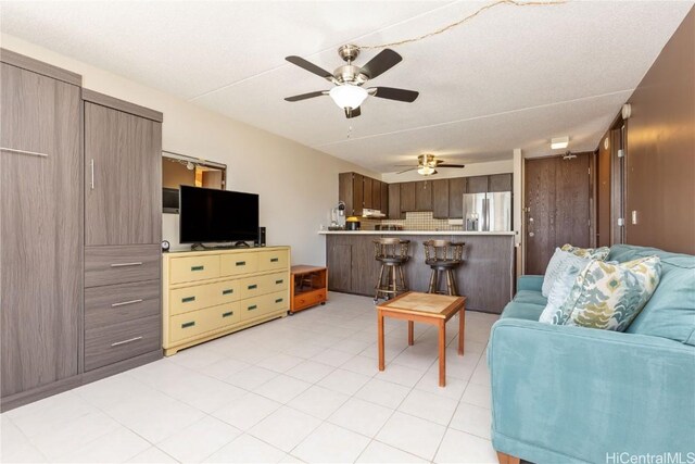 living room featuring ceiling fan