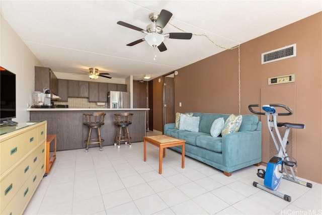 living room with ceiling fan