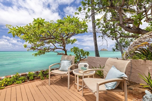 wooden terrace with a water view