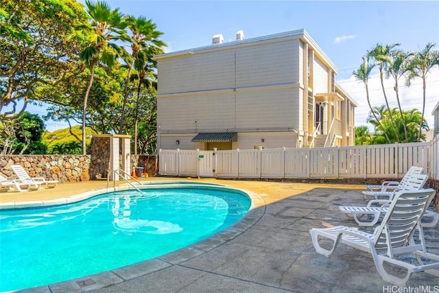 view of pool with a patio area