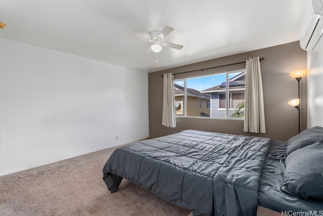 bedroom featuring carpet flooring, a wall mounted air conditioner, and ceiling fan