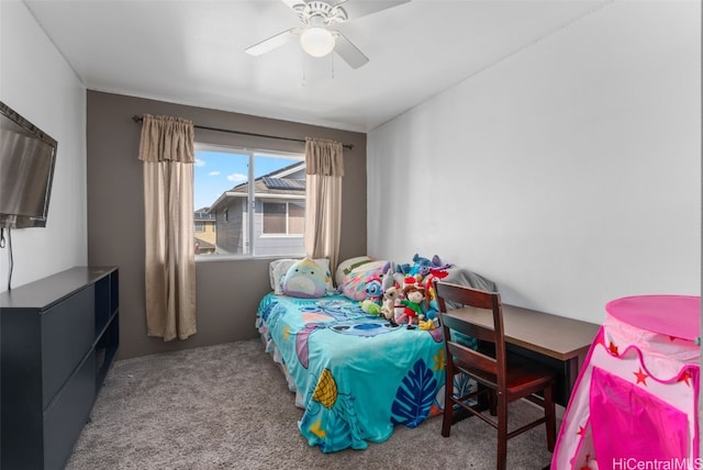 bedroom featuring ceiling fan and light colored carpet