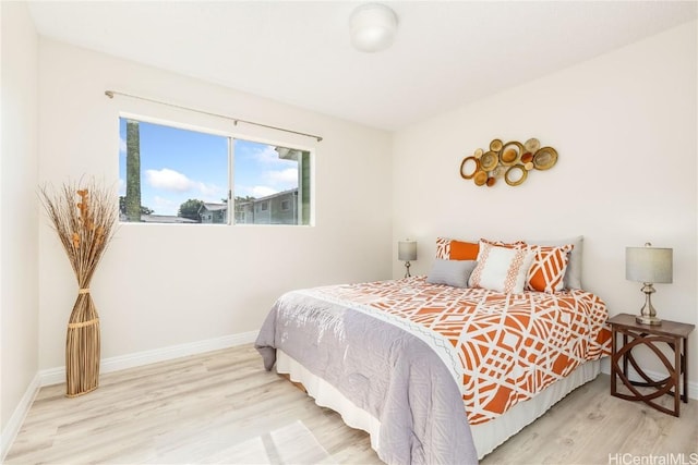 bedroom featuring light wood-type flooring