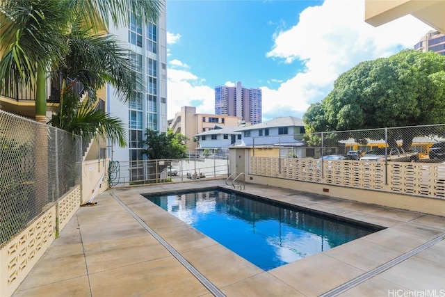 view of pool with a patio