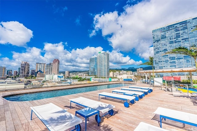 view of swimming pool featuring a view of city