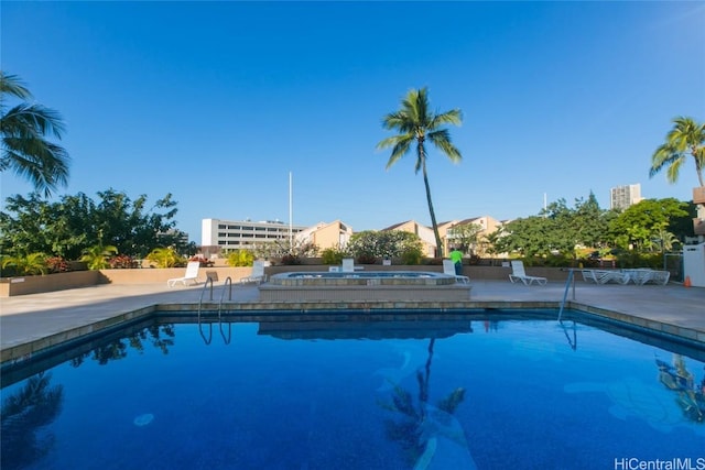 view of pool featuring a patio