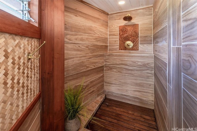 interior space with tiled shower