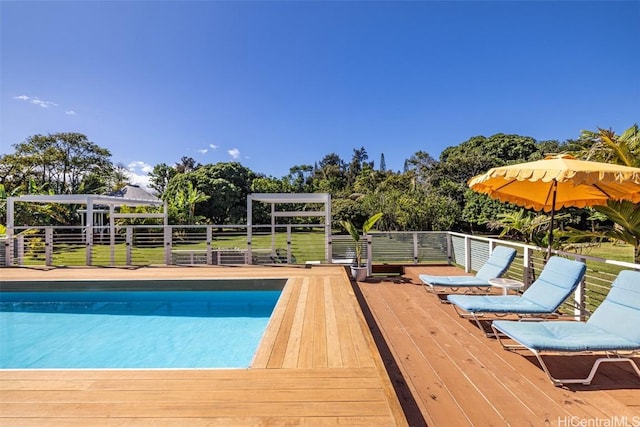 view of pool featuring a wooden deck