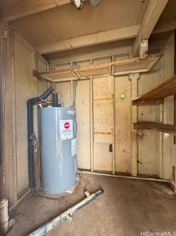 utility room featuring water heater