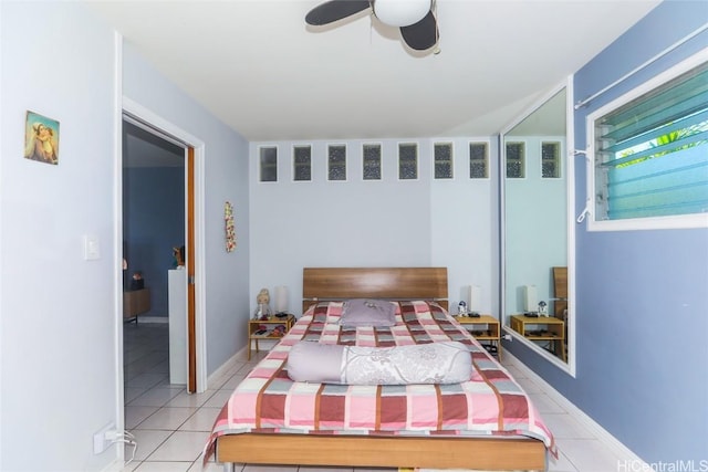 bedroom featuring ceiling fan and light tile patterned floors