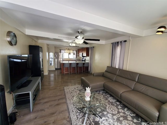 living room featuring dark hardwood / wood-style floors and ceiling fan