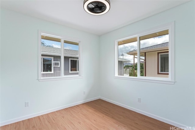 unfurnished room featuring light wood-type flooring