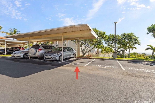 view of car parking featuring a carport