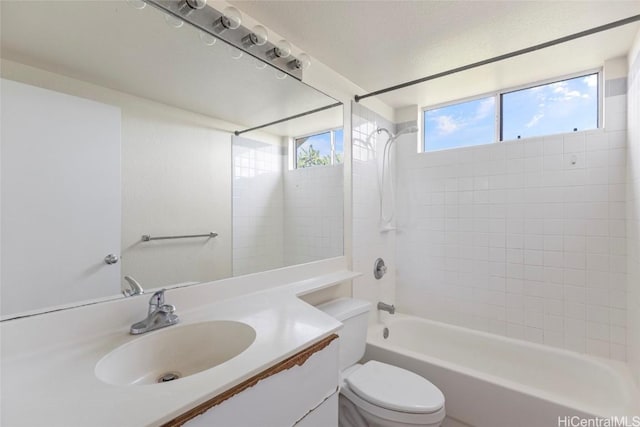 full bathroom with shower / bathing tub combination, vanity, and toilet