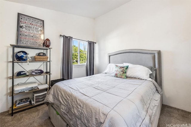 bedroom with dark carpet