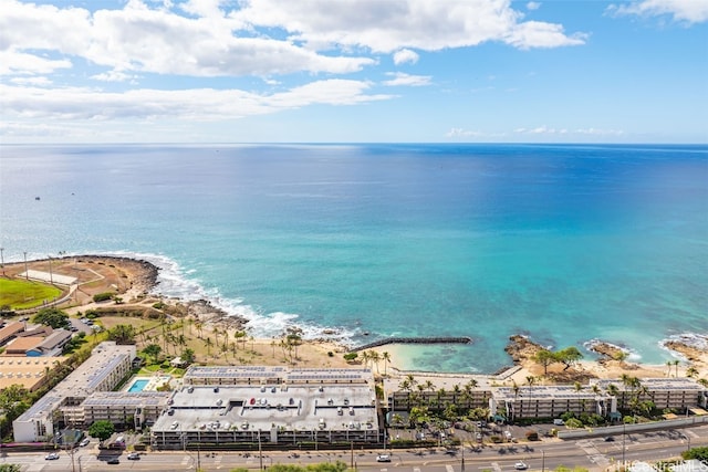 birds eye view of property with a beach view and a water view